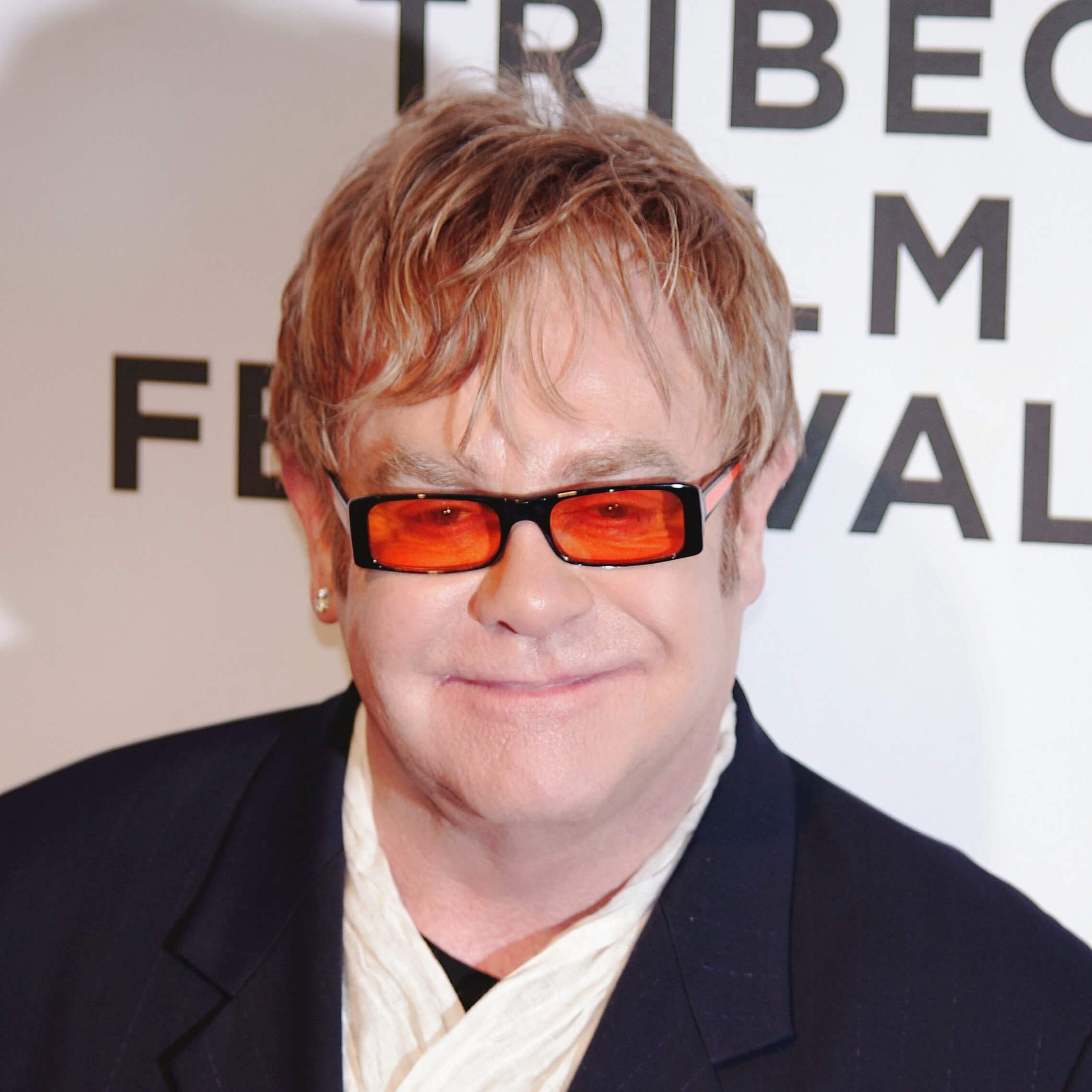 Elton John Biography • Sir Elton Hercules John CBE • British Musician